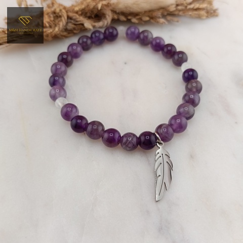 bransoletka-z-kamieni-naturalnych-ametyst-i-kryształ-górski-handmade-zbliżenie-na-kamienie